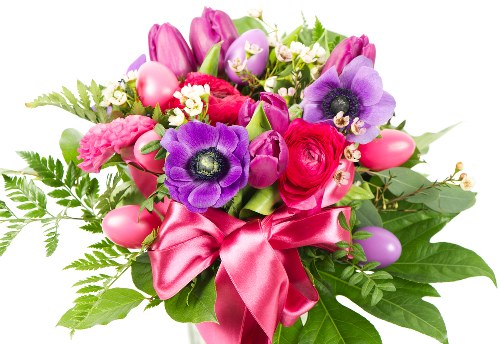 Local florist arranging flowers for delivery in Hixon