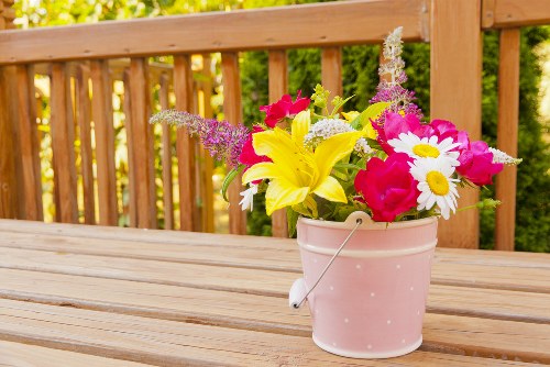 Professional florist preparing a custom flower arrangement